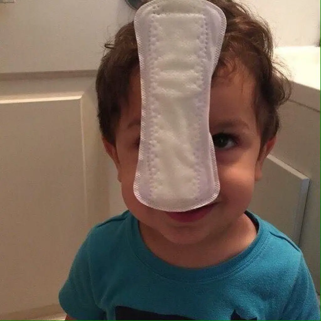 Kid with pad stuck to his face