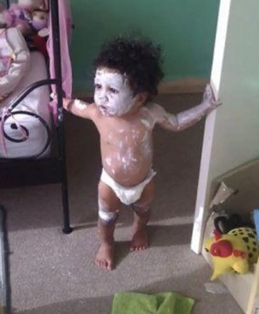 Boy covered in flour