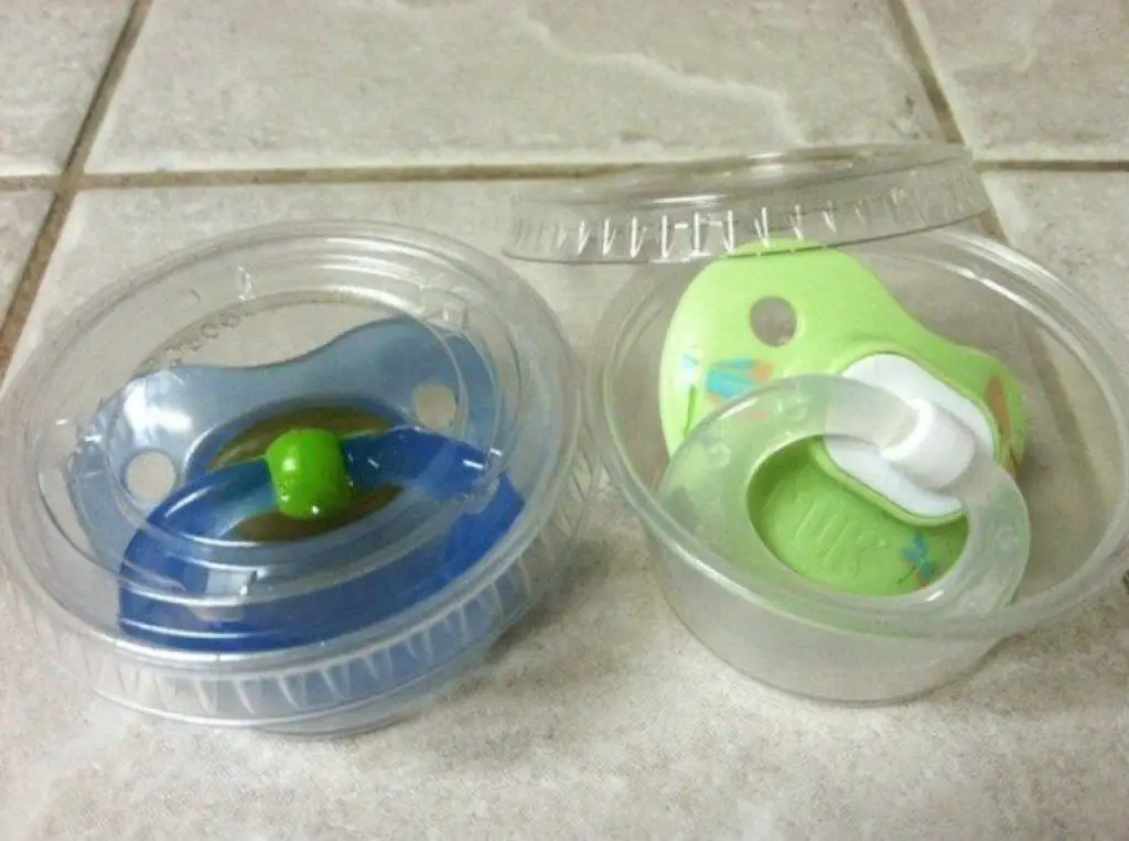 Pacifiers in to-go condiment cups