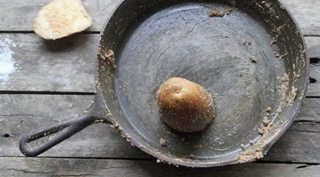 cleaning cast iron with a potato