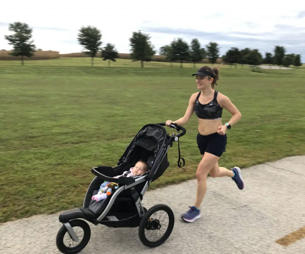 mom running with baby in stroller